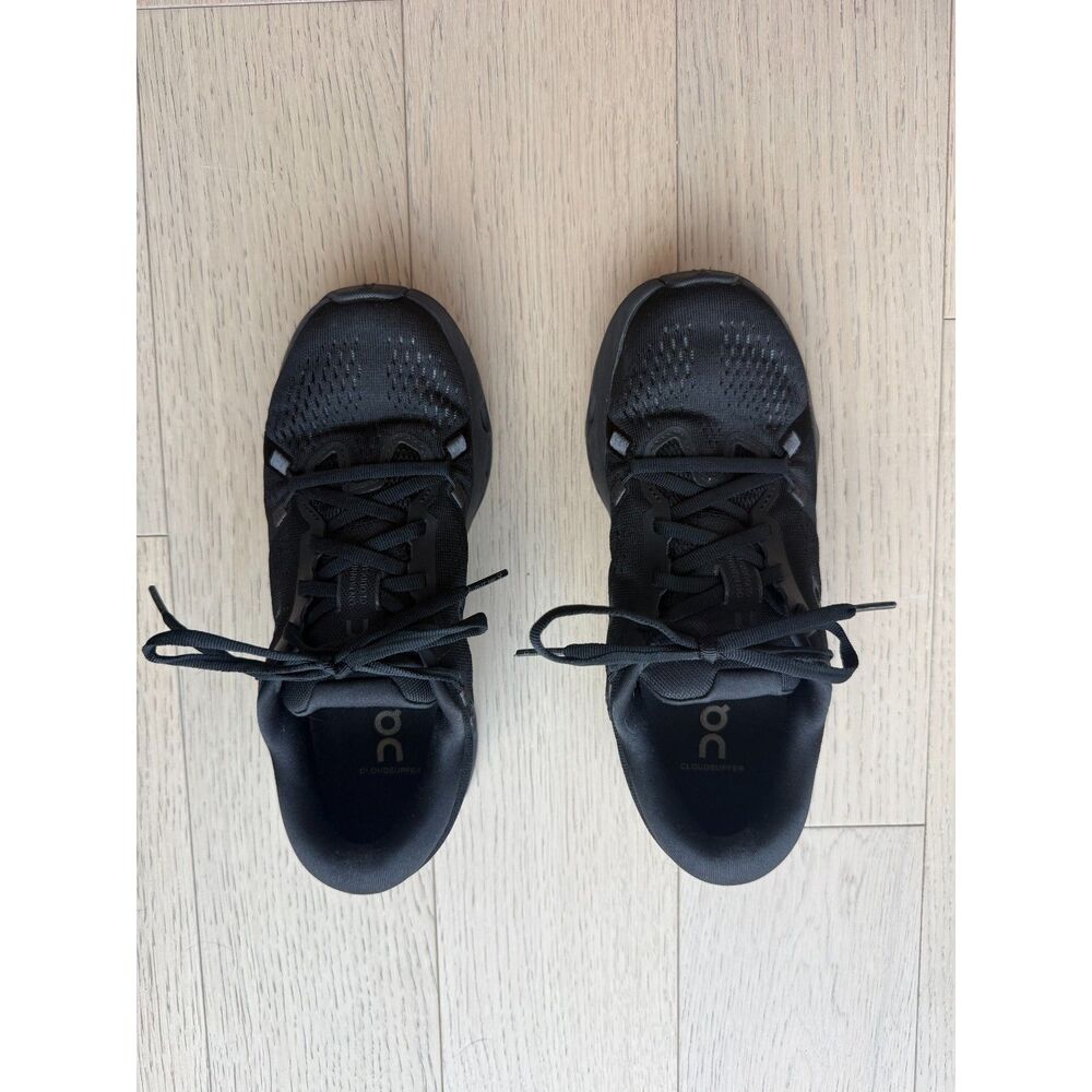 Sleek, all-black On Cloudsurfer 2 running shoes in women’s size 7.
